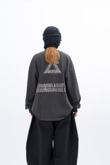トライアングルピグメント長袖Tシャツ
