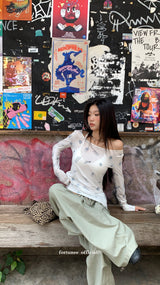 Item Span off shoulder long sleeve tee