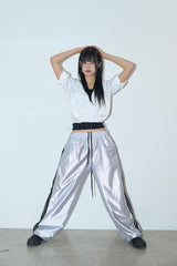 Bright glossy track pants