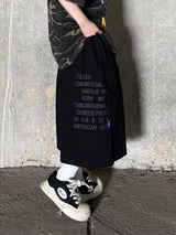 one-pocket lettering bermuda pants