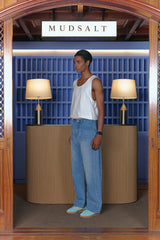 WASHING CURVED WIDE DENIM PANTS LIGHT BLUE