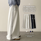 Polty 86 Numbering 3 Line Track Wide Pants