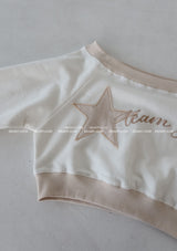 Star patch off-shoulder cropped sweatshirt