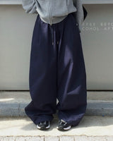 One-pin tuck strap balloon cotton pants