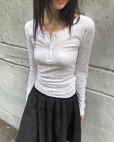 リベッドボタンラウンドネックロングスリーブTシャツ