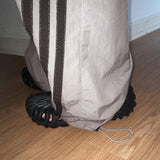 Dyoka Diagonal Track Nylon Two-Way Wide Pants