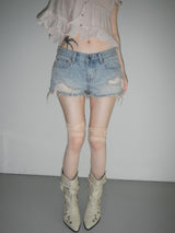 orange destroyed shorts