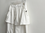 Log banding layered pocket skirt pants