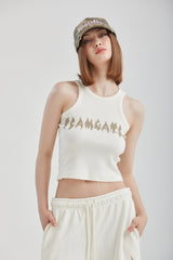 FLARE SLEEVELESS TOP