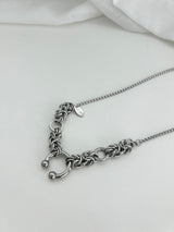 Metal pierced twisted Necklace