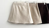 Humming Waist Banding Woolen Miniskirt