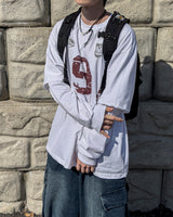 Nine Layered Over Long Sleeve Tee