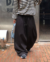One-pin tuck strap balloon cotton pants