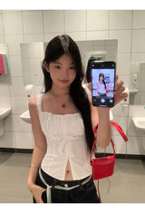 ホワイトスマイルスリーブレスブラウス