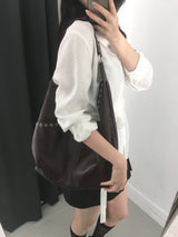 eyelet shoulder bag