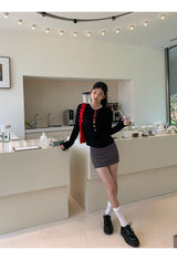 Red bow slit long-sleeved knit shirt