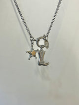 Bold boots and star necklace