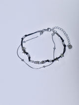 Swirl layered string star bracelet
