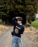 ノックウォッシュドグラフィックオーバーフィットスウェットシャツ