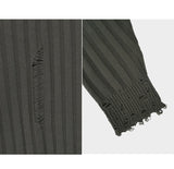 Bold ribbed damage over knit