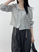 Leche Strap Button Long Sleeve Blouse