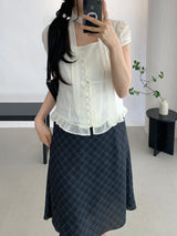 Sovy check flare midi skirt