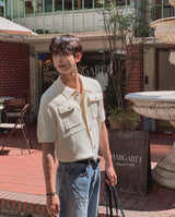 Leviron Two-Pocket Cut-out Collar Short-Sleeve Cardigan