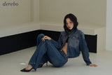 Round medium blue zip-up denim jacket
