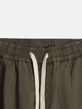 Curved diagonal cargo banding pants