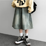A.D washing side pintuck over wide denim shorts