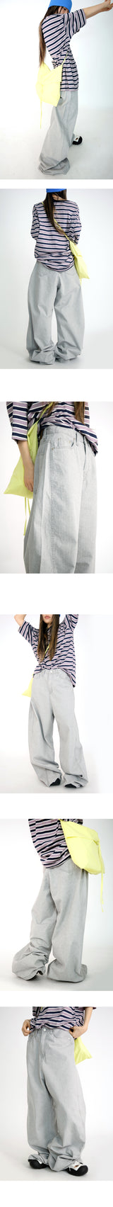 over wide gray pants