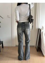 Grayish boots cut denim pants 