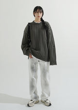 Bold ribbed damage over knit