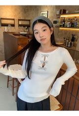 silver bow open ribbed long-sleeved knitwear