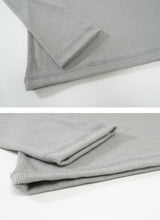 Curve slit ribbed top