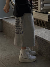 one-pocket lettering bermuda pants