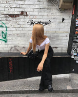 Black stitch boots cut pants
