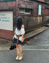 a raw paper stitch jean skirt
