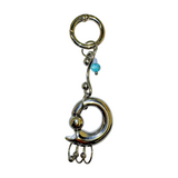 Curved pierce keychain