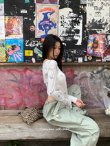 Item Span off shoulder long sleeve tee