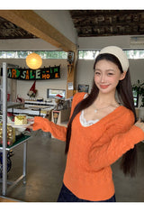 オレンジディープVネックツウィステッドロングスリーブニットウェア