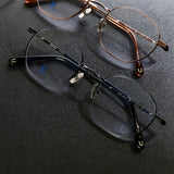 Knouun Round titanium glasses CODE. 101. A Black
