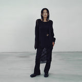 Loose drop label knit