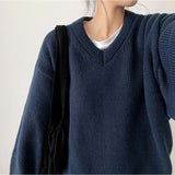 Disco Pop Duc Thick Sleeve Punching V-Neck Knit