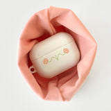 oab flower airpods case (ivory)