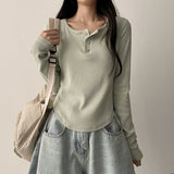 Its Hem Round Button Long Sleeve Tee