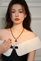 ブラックデイジーネックレス / BLACK DAISY NECKLACE