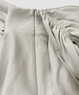 ASYMMETRIC DRAPE SKIRT