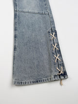 Sage cross lace denim pants