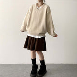 Disco Pop Duc Thick Sleeve Punching V-Neck Knit